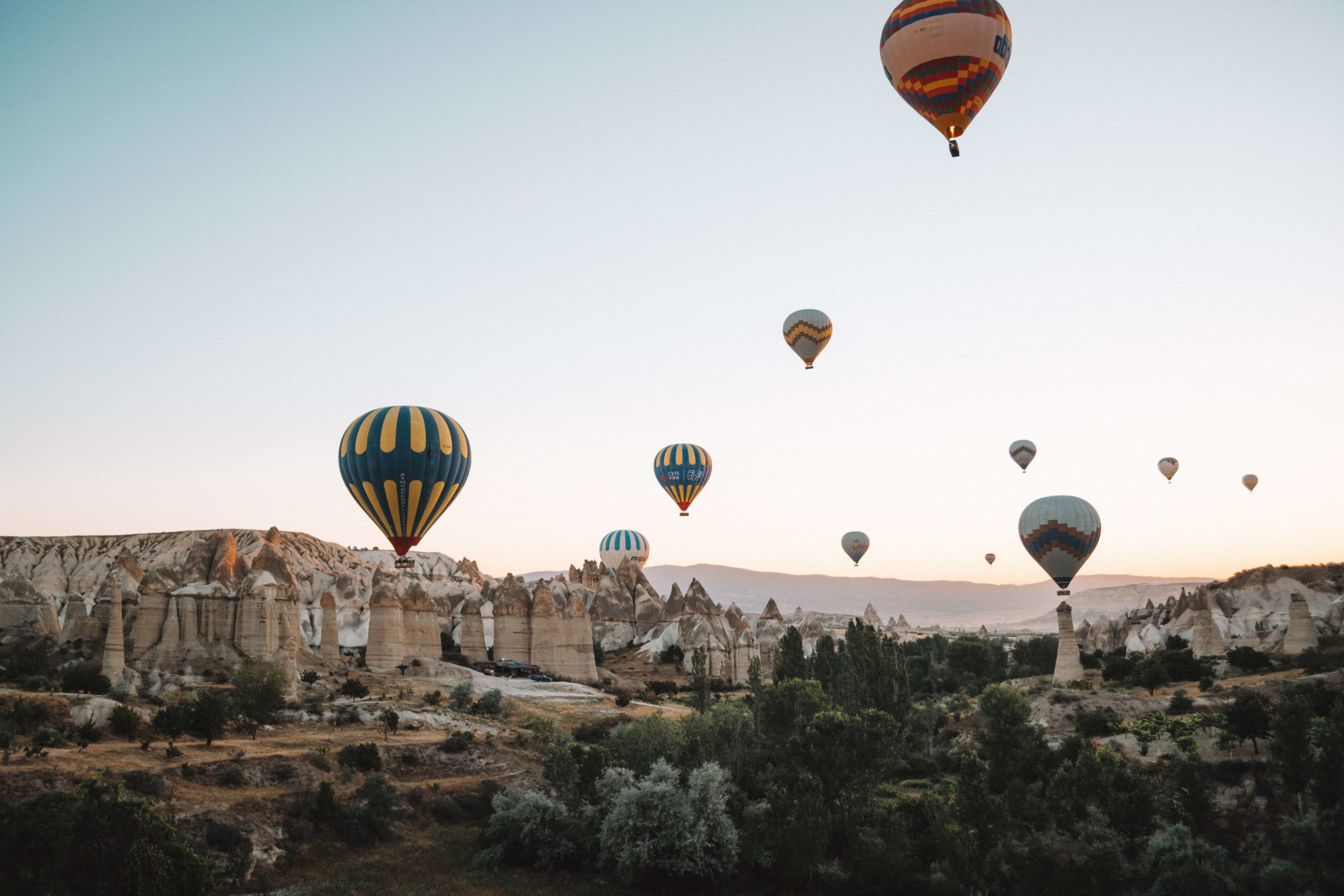 Hot air balloons high over Cappadocia, Turkey.